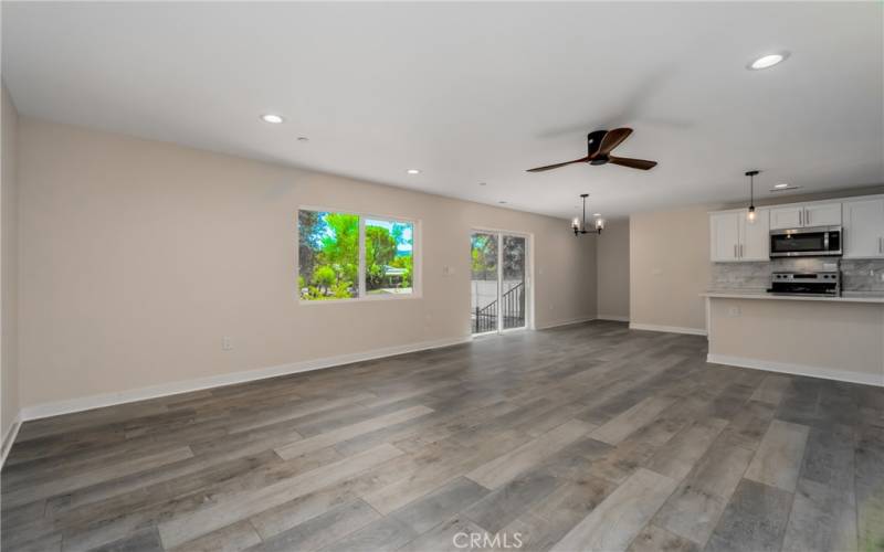 Living room to sliding door and back yard.