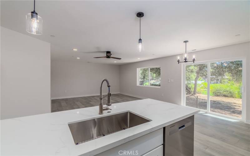 Kitchen to sliding door and back yard.