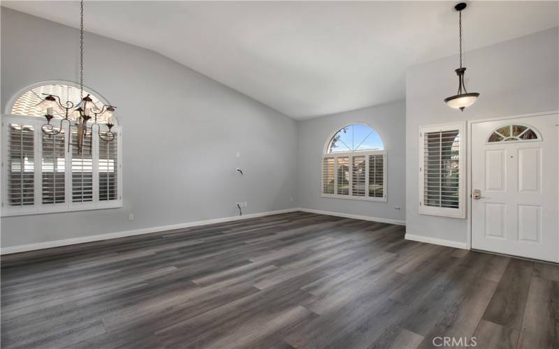 Shows entryway and living room