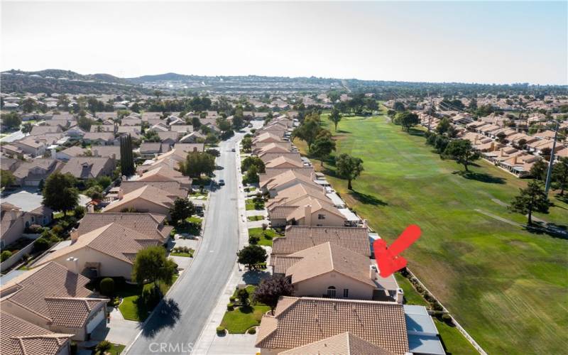 Aerial view shows location on tee box and looking up the fairway