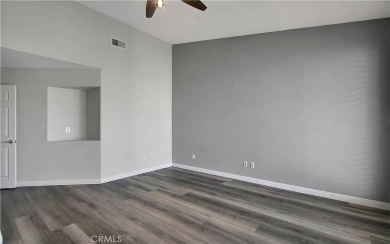 Large Main bedroom with ceiling fan/light