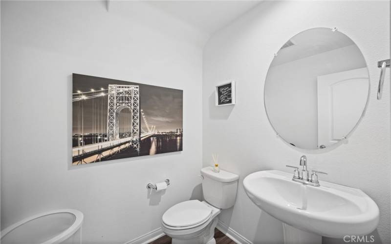 Downstairs half bath for visitors close to Living and Family room area.