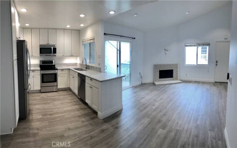 Gorgeous new flooring and light/bright cabinetry!  Coastal elegance....