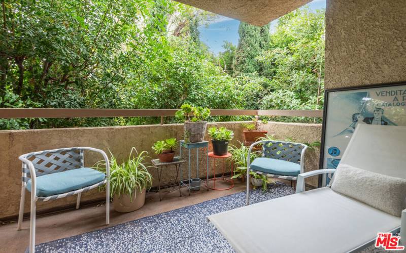 Very private patio surrounded by mature trees