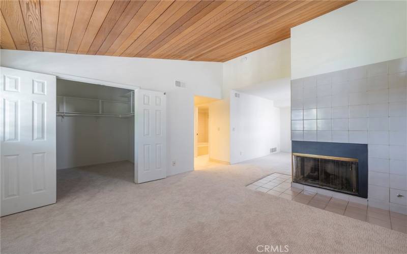 Masterbedroom with double sided gas fireplace