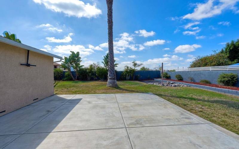 This outdoor patio awaits your exterior furniture and provides ample room to entertain~