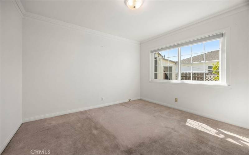 Not verified, but possible hard wood floors under carpet in the the bedrooms as this is a raised foundation home.