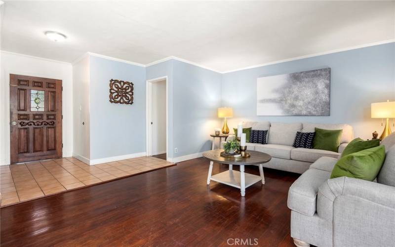 The living room and dining area has the original hardwood floors!