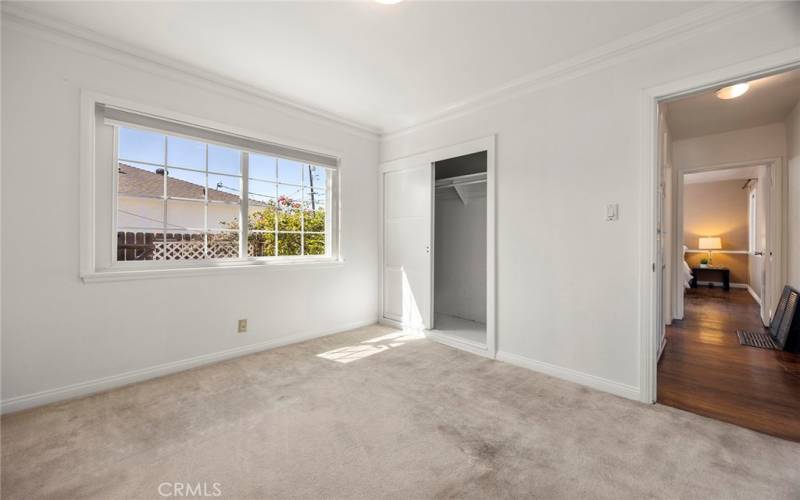 Sleep well - live better! Bedroom 2 has a picture window facing the side yard. All of the bedrooms have windows that bring in natural light!