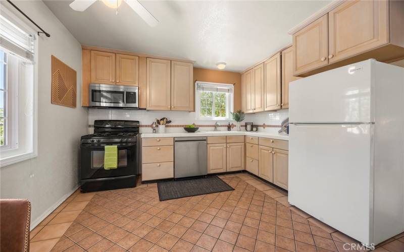 This kitchen kitchen has plenty of space for more than one cook in the family!