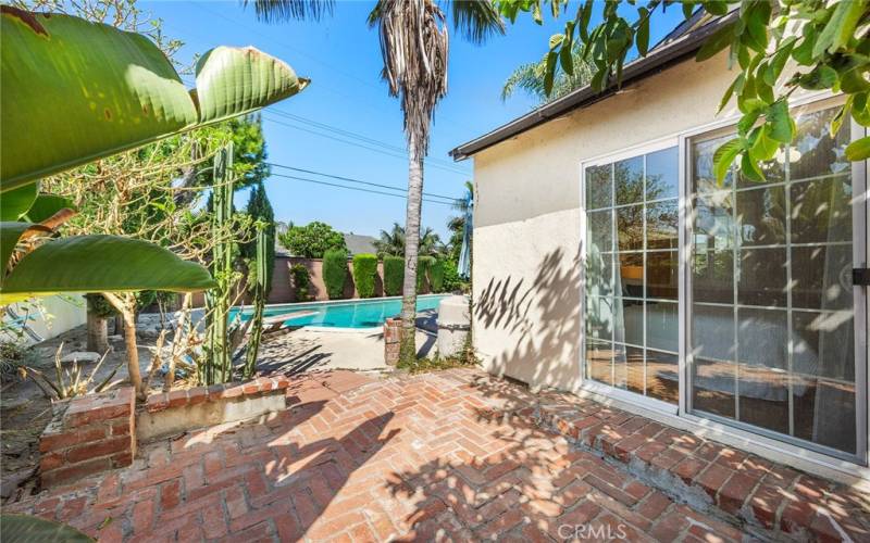 Side yard of the home has a guava tree and plenty of space to add on.