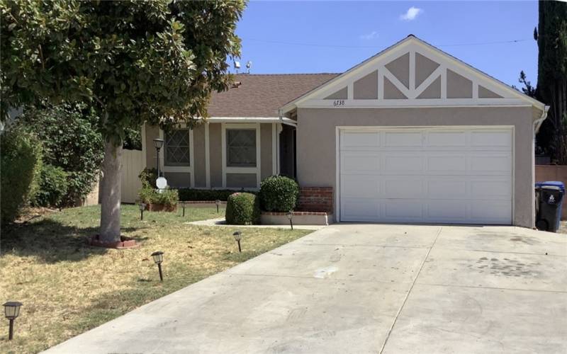 Landscaped yard, Large driveway & 2-Car Garage