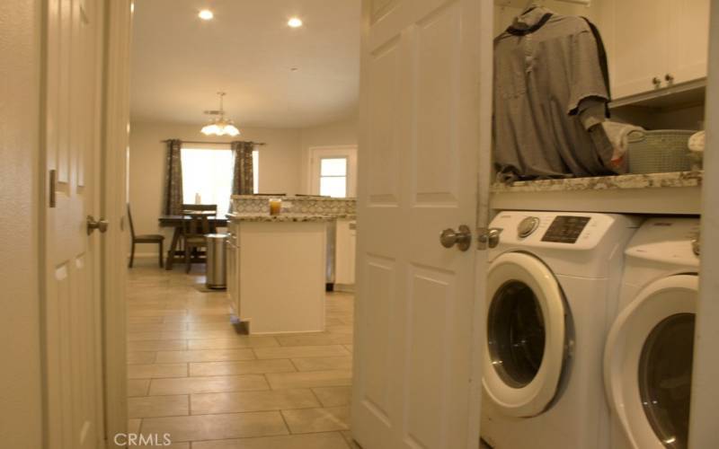 Half-bathroom on the left, laundry on right