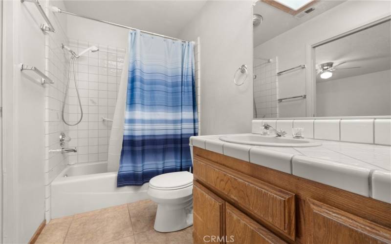 2nd Full bathroom.  Door to hallway and door to the 2nd bedroom