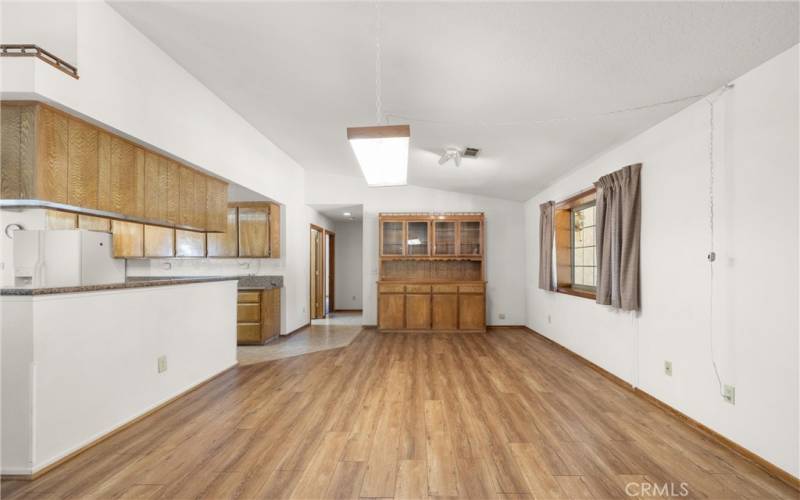 The main primary bedroom and laundry room are down the hallway.