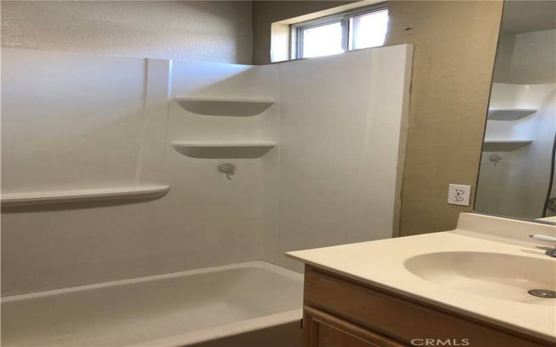 Master Bath with Dual Vanities, Shower over Tub, Private commode area, an Dual walk-in closets