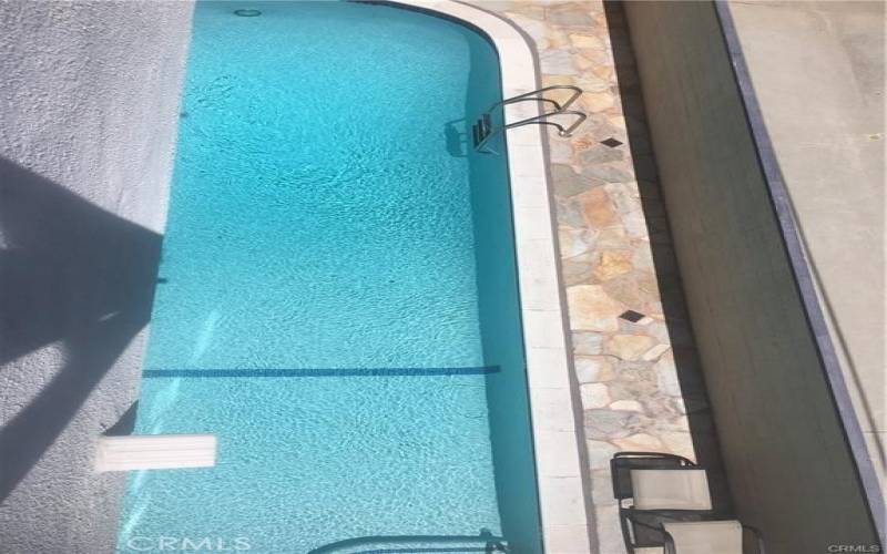 balcony overlooking pool