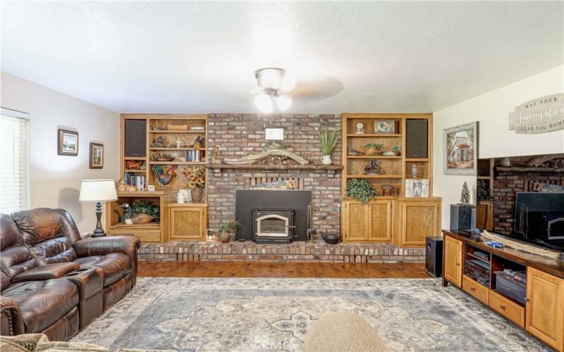 Lovely brick fireplace in great room.