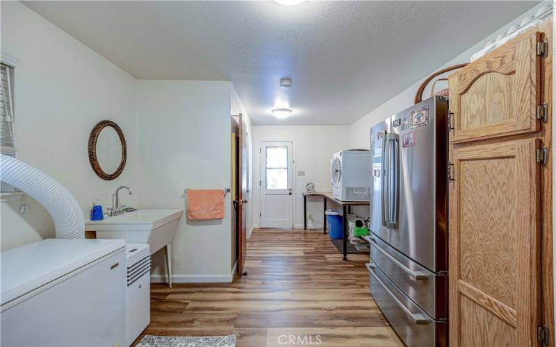 Large indoor laundry room. Lots of storage.