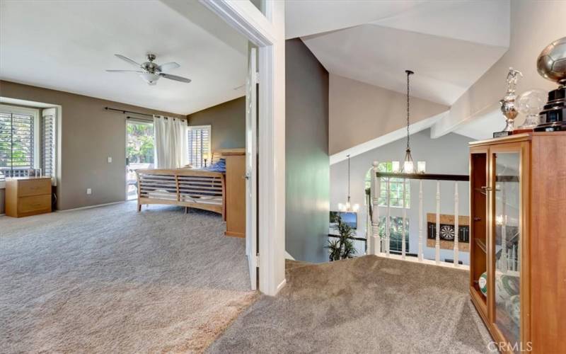 Upstairs landing looking into primary bedroom suite