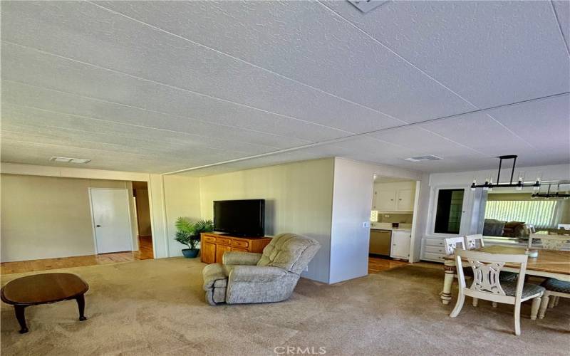 Living room view to dining area and entryway