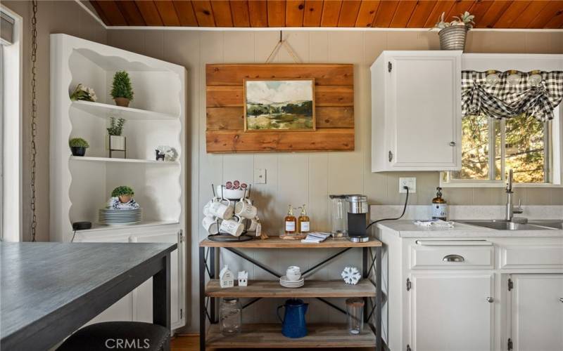 Kitchen with built in corner cabinet.