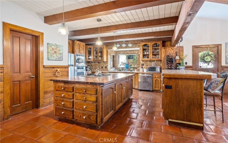 Kitchen with pantry door on left