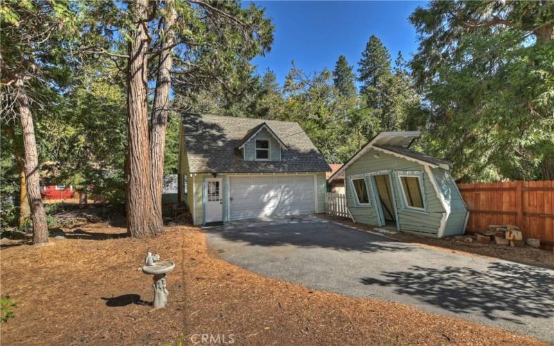 Detached garage and wood shed