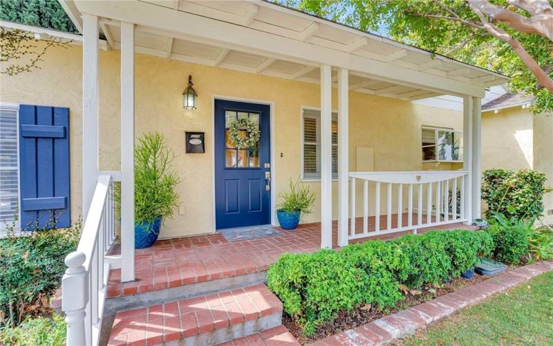 Side entrance porch (facing Beechwood Place) that owners use as main entrance most of the time.