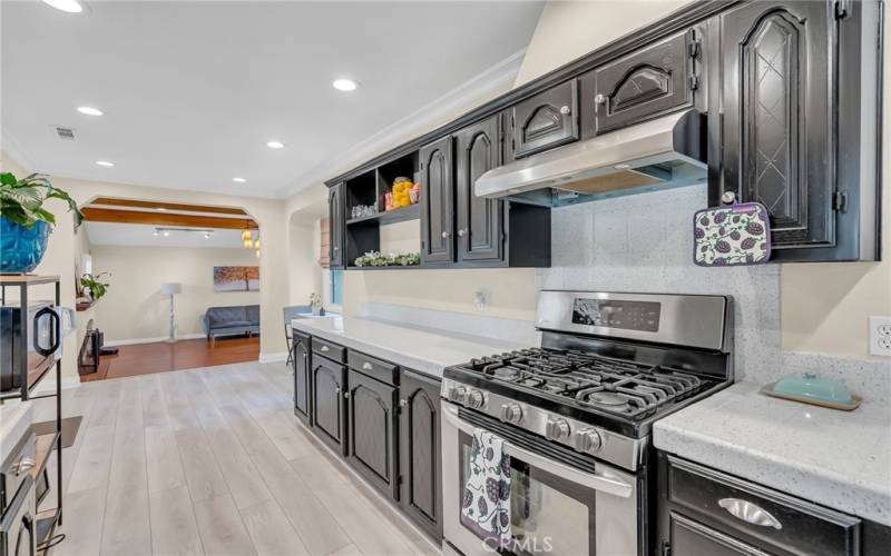 Remodeled kitchen with view into the step-down family room.