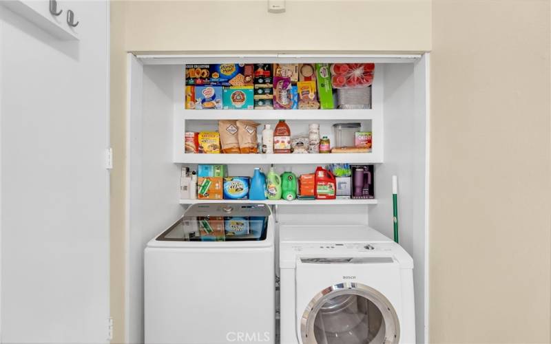 Indoor laundry room just off the kitchen.