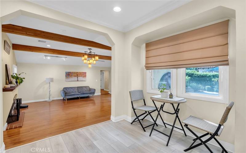 Quaint informal dining area in kitchen overlooking the private backyard.