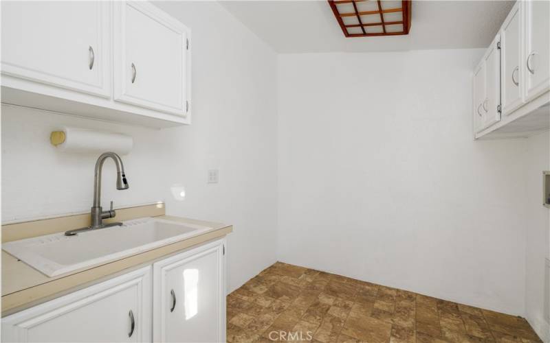 Laundry room with outside access