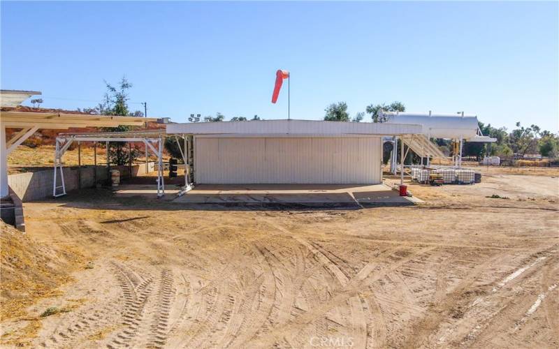 Hangar and covered parking with hoist