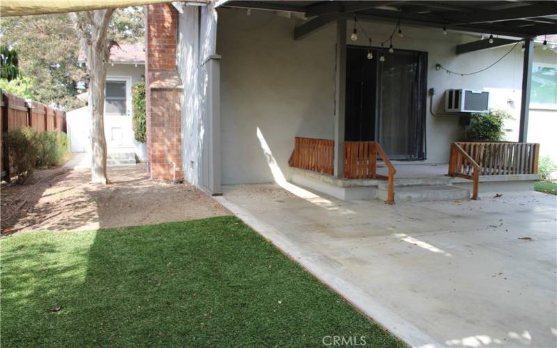 Rt. Side Yard with both Kitchen & Garage Access & Storage Shed