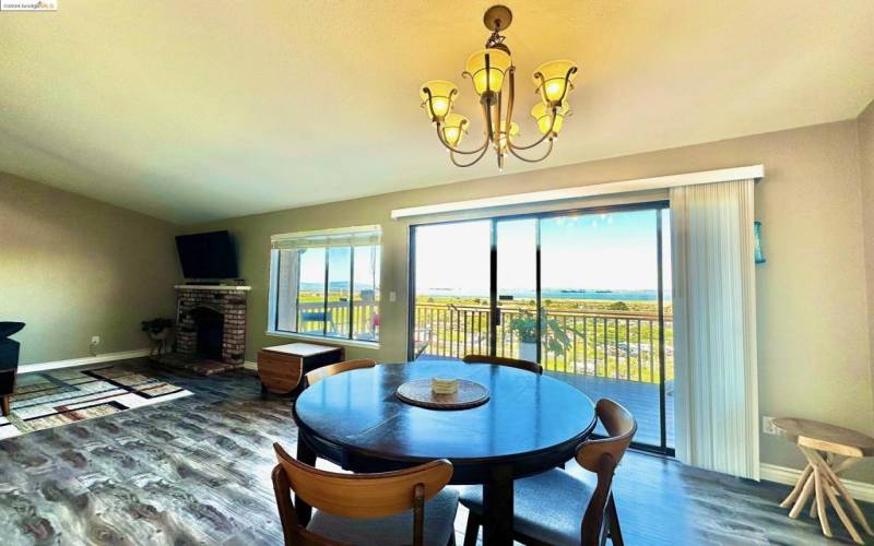 The formal dining area & open living room both showcase stunning views!