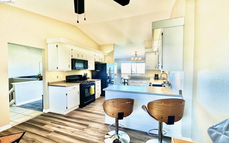 Steady flow from the breakfast nook through the kitchen to the dining room.