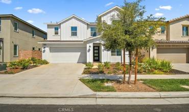 Welcome to 2571 E Violet Ln! A highly upgraded Amberly Plan 1 model in the ShadeTree Community