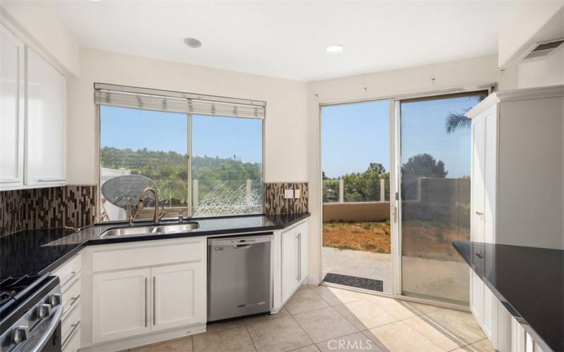 There is plenty of natural light in the kitchen area.