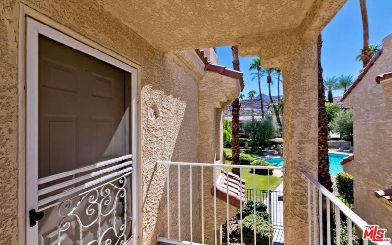 view of the pool from unit doorway