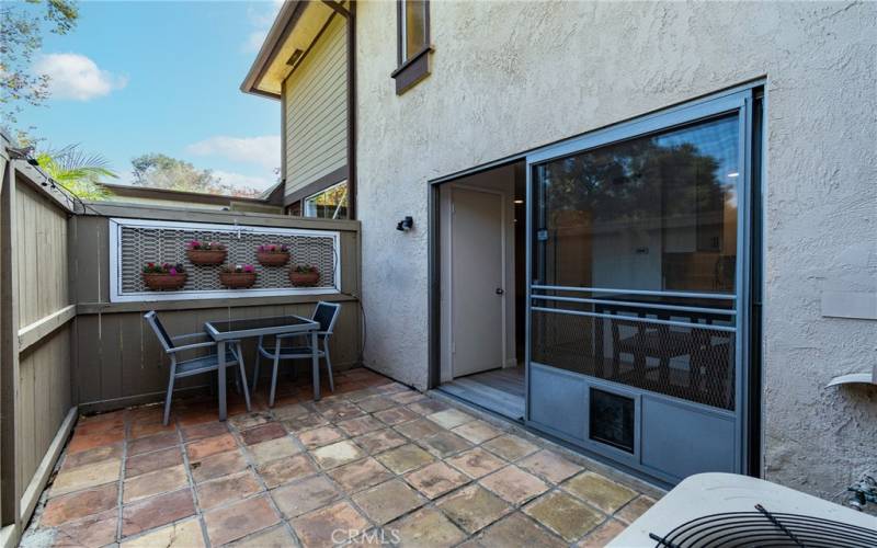 Fenced yard perfect for outdoor dining.