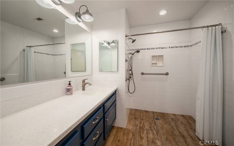 Updated hall bathroom with walk in shower.