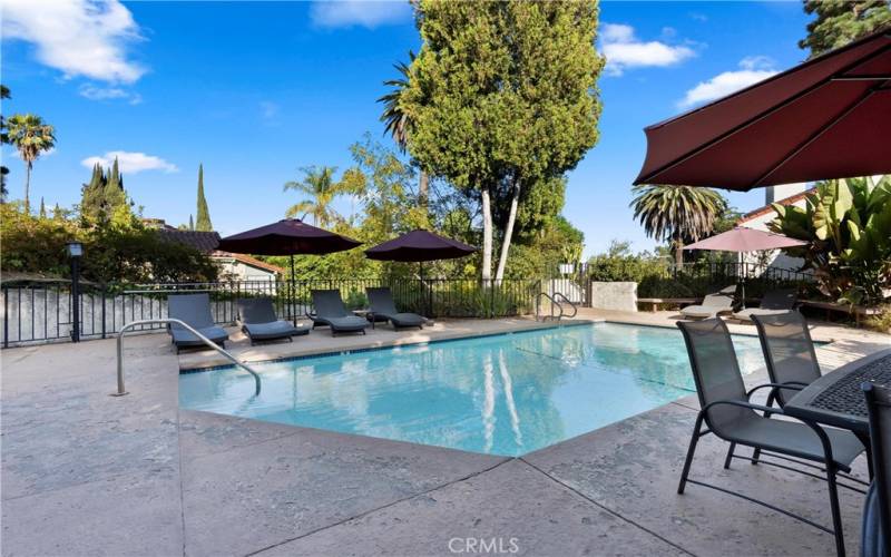 Lots of deck area surrounding  pool and spa.