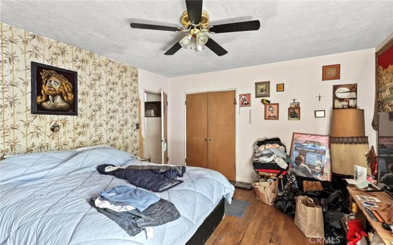 Bedroom with Wardrobe Closet and Ceiling Fan