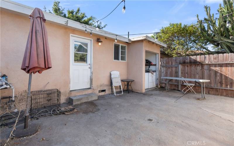 BACK YARD &  EXTERIOR LAUNDRY ROOM VIEW