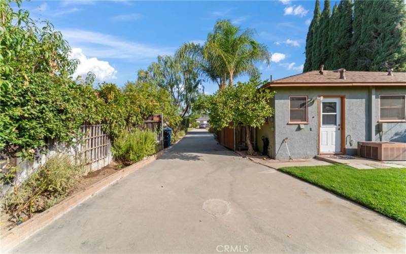 Long Spacious driveway with rolling door