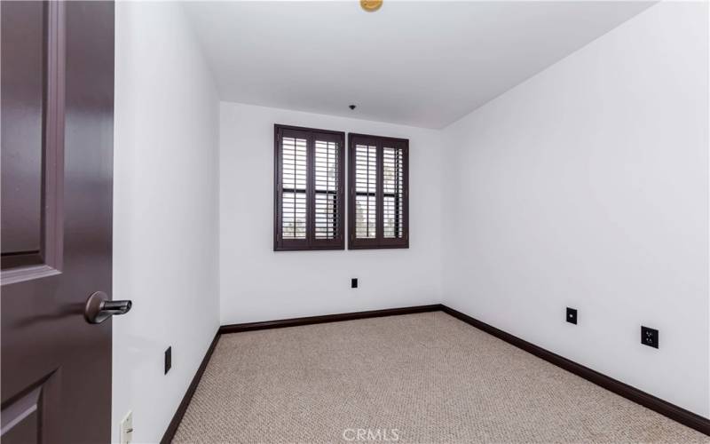 Bedroom 2 w Views and Wood Shutters