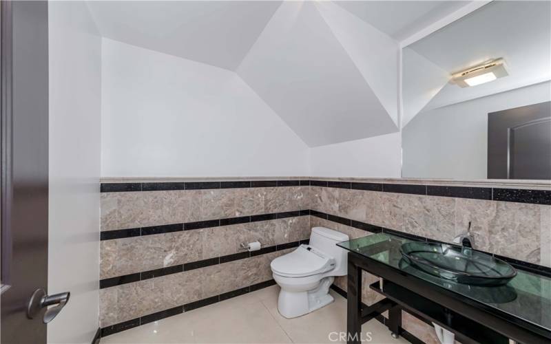 Downstairs Bathroom w Gorgeous Stone Work & Bidet Toilet