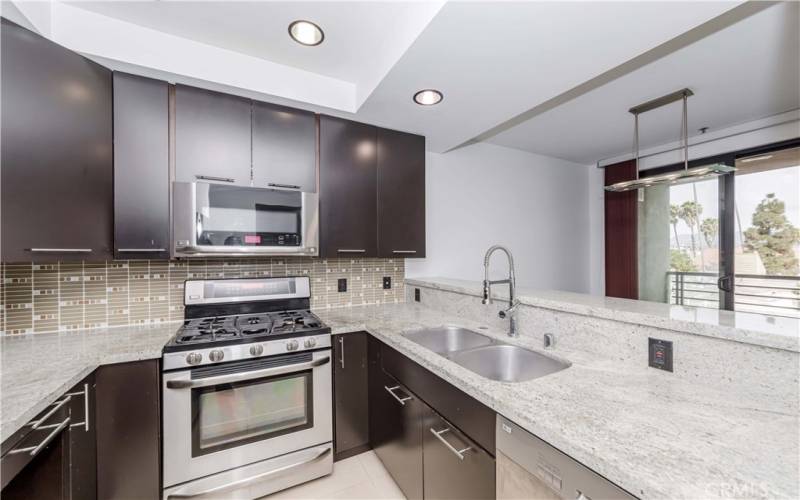 Updated View Kitchen w LG Appliances, Granite & Glass Tile Backsplash