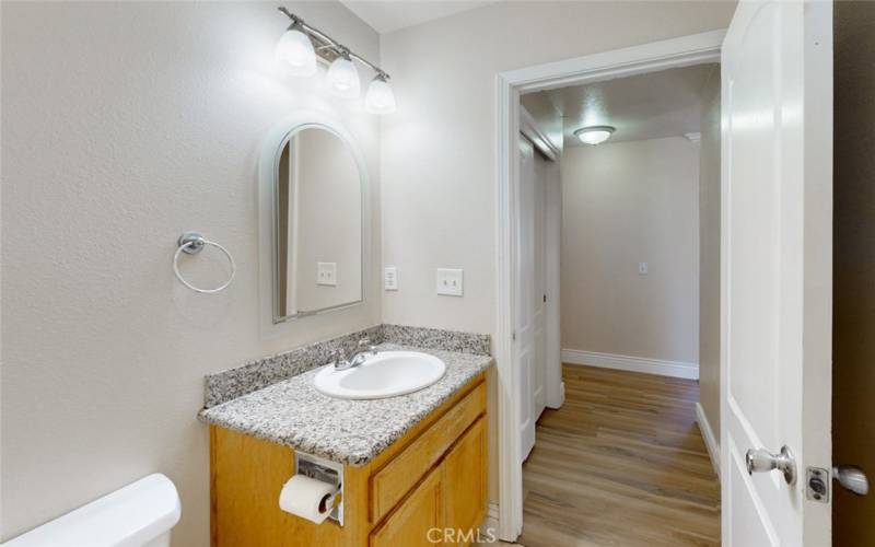 Coat/Linen closet just outside hall bathroom.